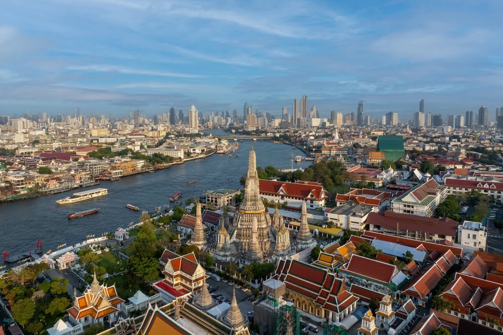 Wat Arun is a landmark temple on the west bank of the Chao Phraya river. It’s easily one of the most stunning temples in Bangkok, an example of Thailand Real Estate Development.